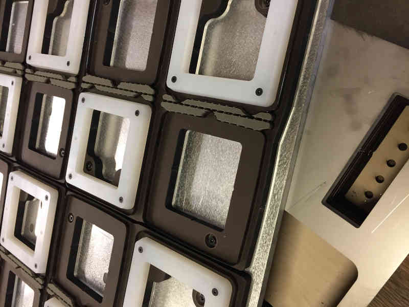 Clamshell trim with locator