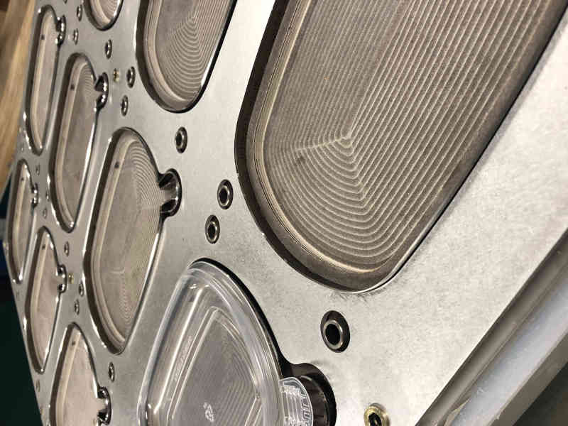 Milled pocket with aluminum retainer 