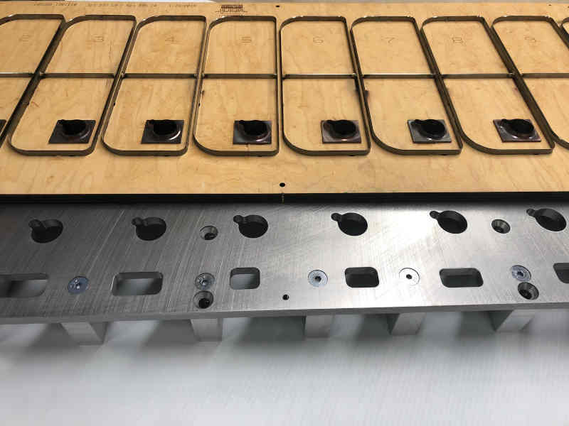 Die with feed thru plate 